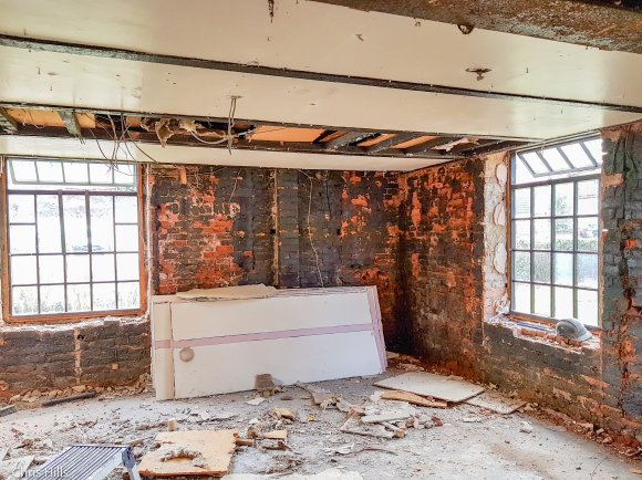 Stripped walls in library alcove