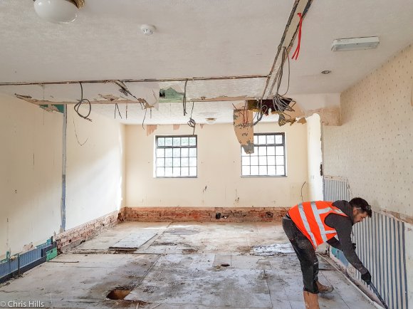 Upstairs front meeting room and open plan office after bedroom walls removed