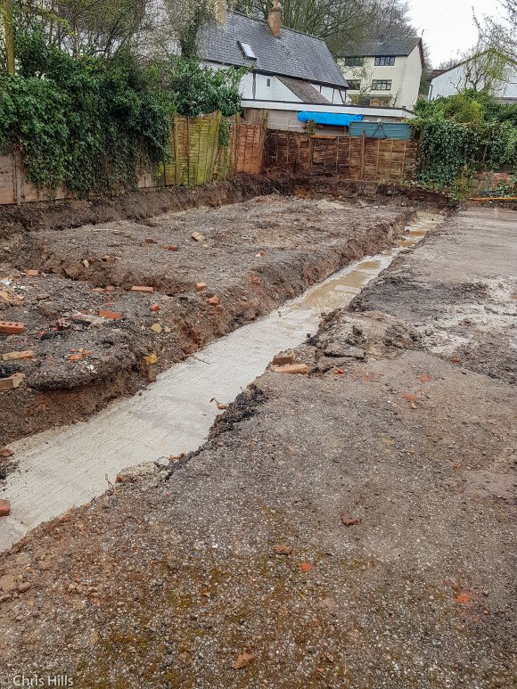 Foundations in place. The contractor found a buried cord of cow horns when digging out the footings